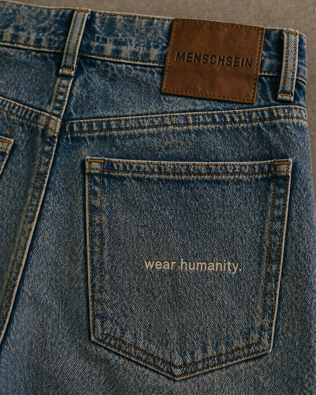 DENIM — RELAXED FIT — “WEAR HUMANITY”