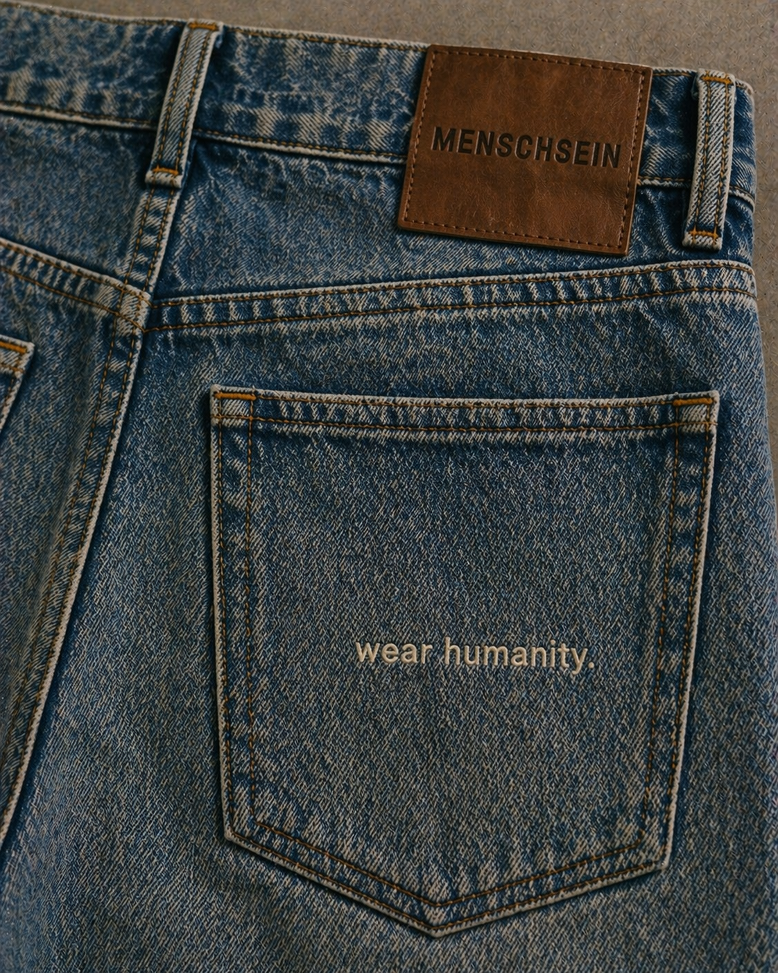 DENIM — RELAXED FIT — “WEAR HUMANITY”